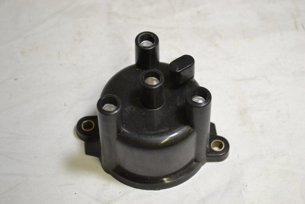 Daihatsu Distributor Cap — OEM replacement part for Daihatsu kei truck | JPM Mini Trucks